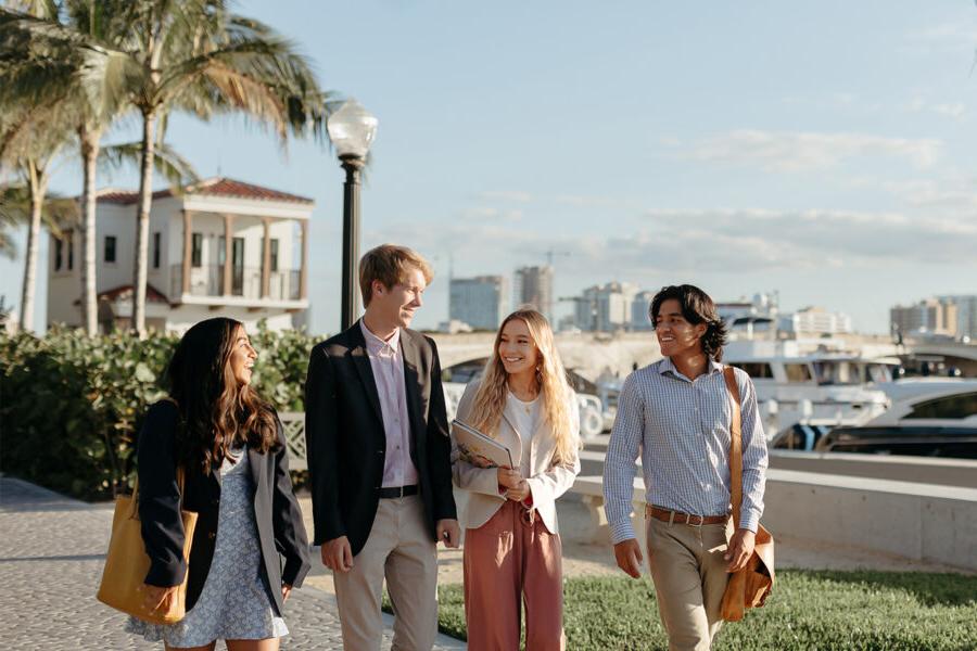 master of business administration mba students walk near the intercoastal waterway in 西<a href='http://f.ivantseng.com'>推荐全球最大网赌正规平台欢迎您</a>.